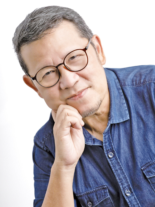 從媒體走到獅城作家 兩度跨海再見祖厝三代願